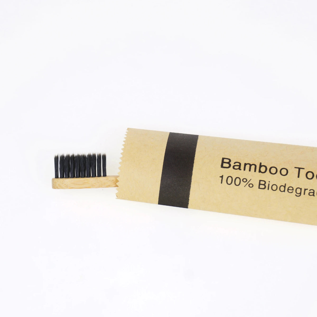 A package of bamboo toothbrushes with soft bristles labeled 100% biodegradable.