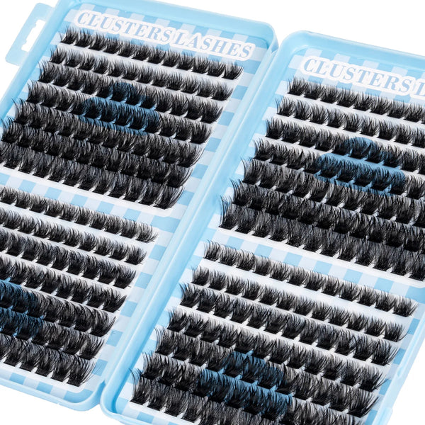 A pair of blue plastic lash trays filled with black and blue lash clusters for DIY mixed lash extensions