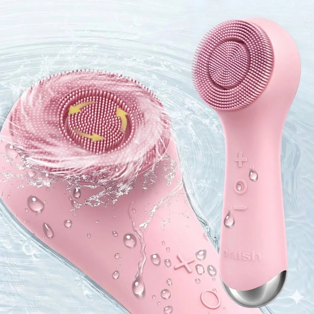 A pink 360° rotating USB facial cleansing brush is shown with water droplets on a light blue background.