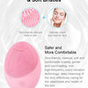 Pink electric sonic facial cleansing brush with soft bristles for skin care
