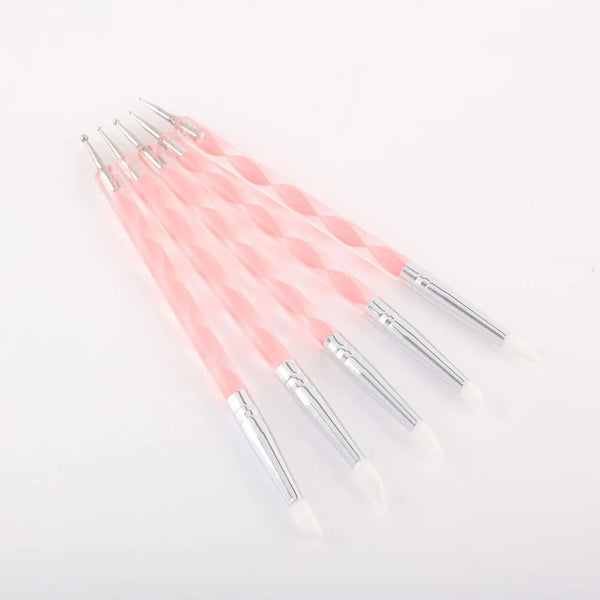 A set of five pink silicone dotting pens with stainless steel tips arranged diagonally on a white background.