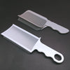 A set of professional flat top hair cutting combs in light gray and white.