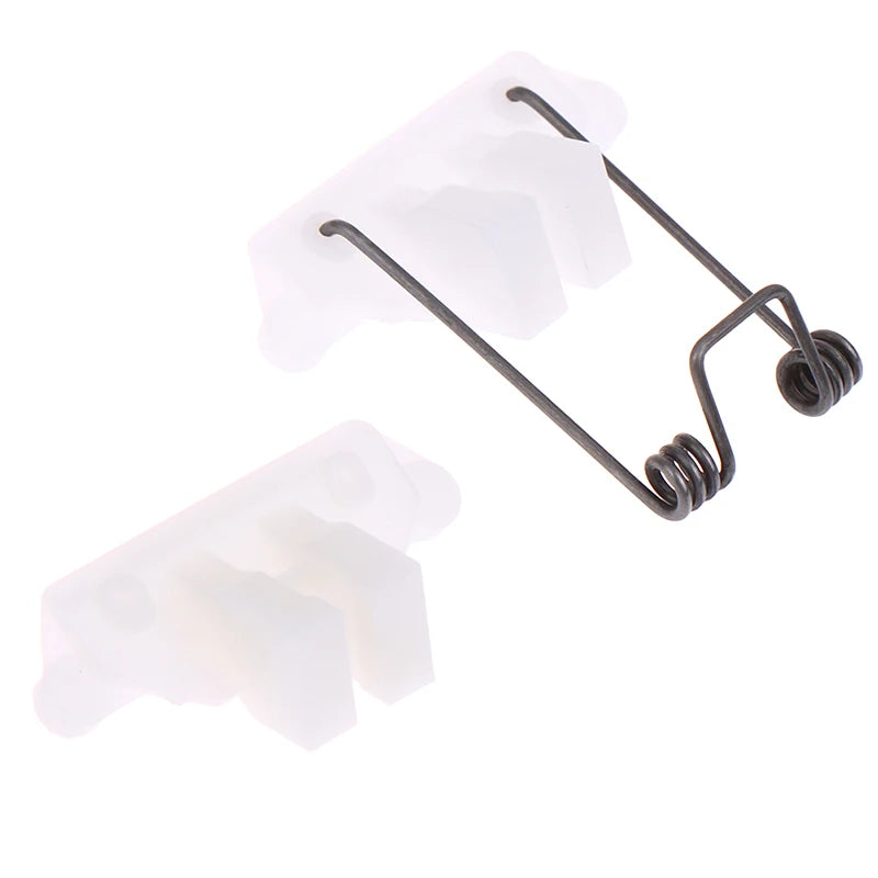 A white hair clipper swing head replacement parts kit with a metal spring mechanism.