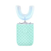 A light mint green automatic sonic electric toothbrush with a clear head and textured body.