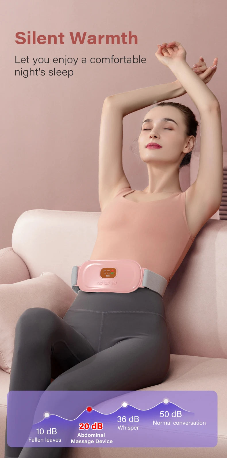 A woman is wearing a pink heated abdominal massage belt while relaxing on a sofa.