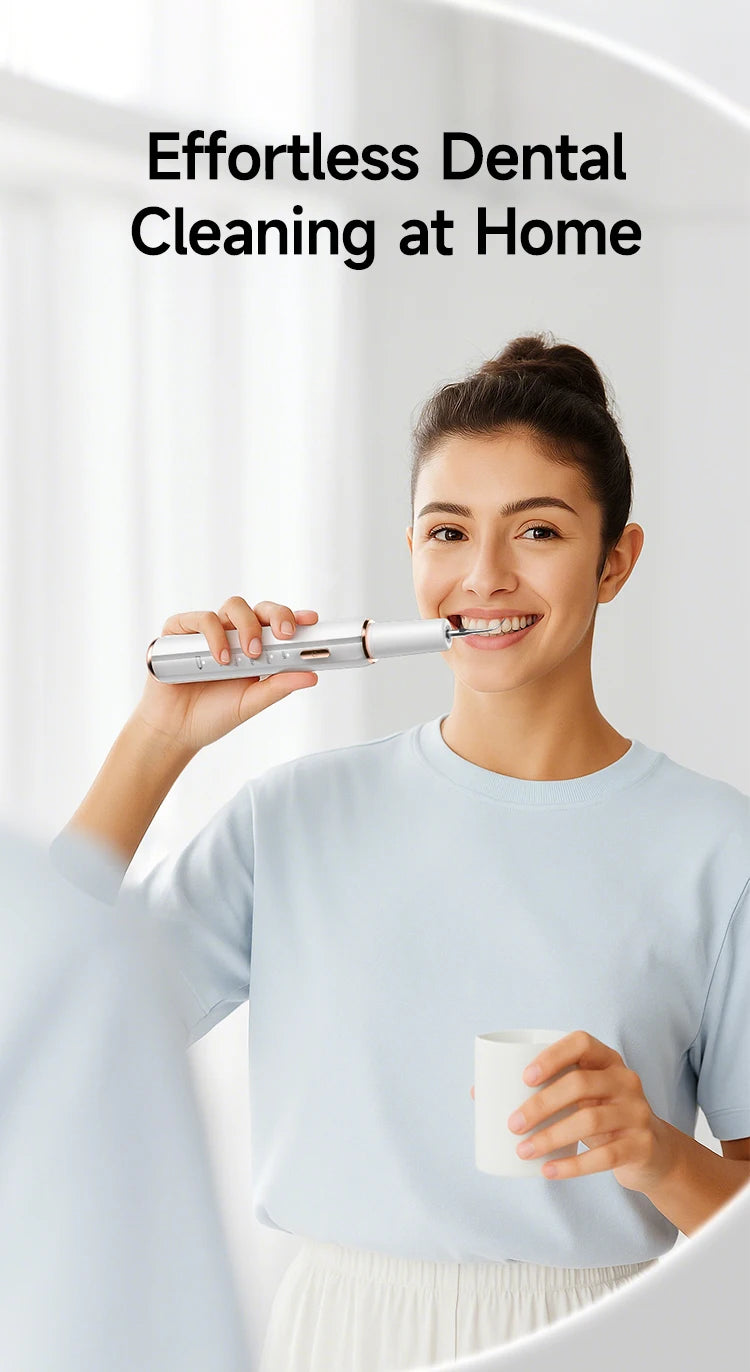 A woman is effortlessly cleaning her teeth at home using a smart ultrasonic dental cleaning device.