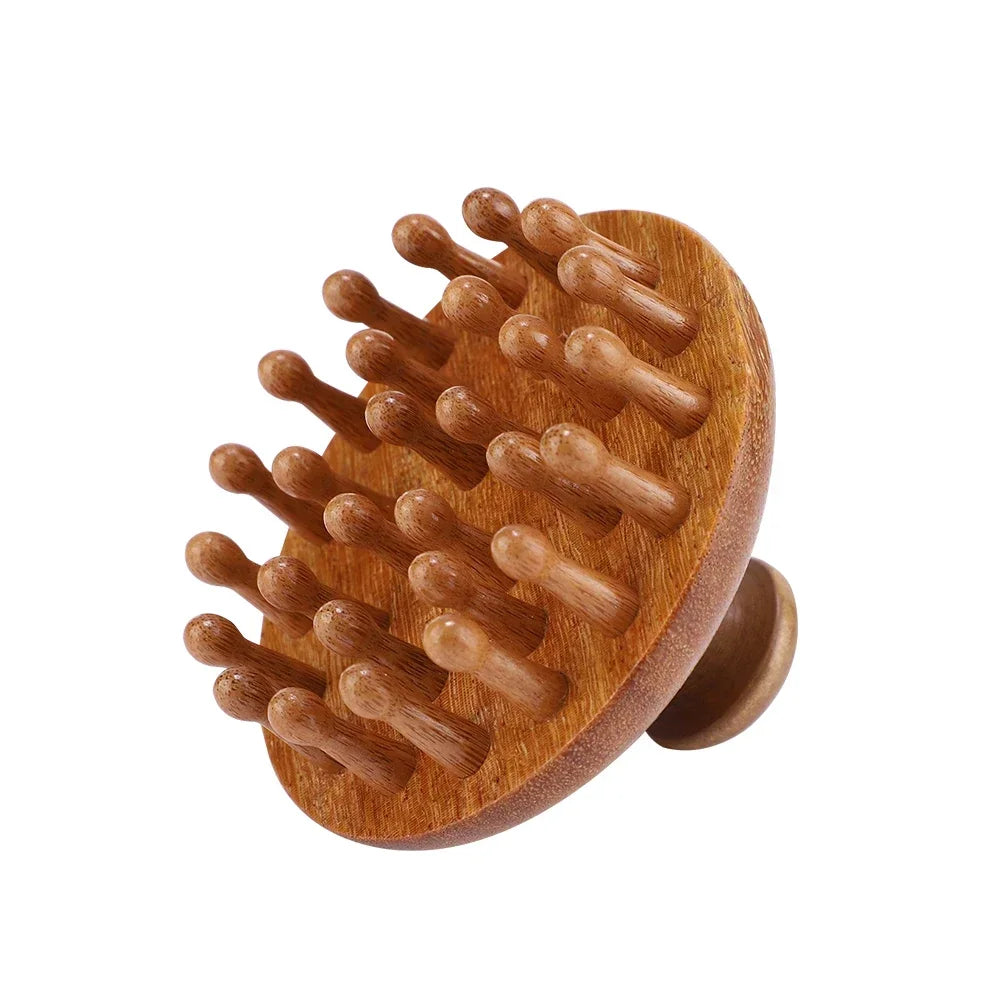 A wooden massage comb with numerous rounded teeth used for therapy or massage.