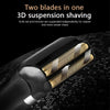 Close-up view of a black electric shaver with two gold blades, showing the 3D suspension shaving design.