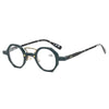 Lunettes de lecture rondes classiques avec monture foncée et accents dorés