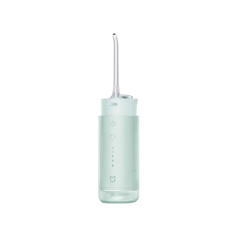 A portable cordless oral irrigator with a clear green body and a long, slender nozzle.
