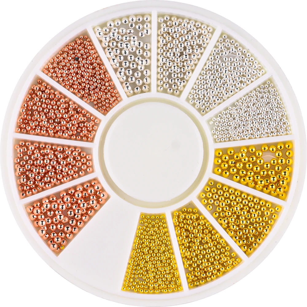 A circular display of gold mixed stainless steel bead nail art decorations arranged in various patterns.