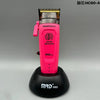 A pink SmartBrain digital brushless hair clipper with a black base.