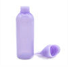 A purple plastic bottle for hair color applicator comb with a fine-tooth comb and a separate applicator tool.