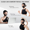 A woman wearing a black athletic top and a black face toning belt demonstrates the comfort of the product for all-day wear.