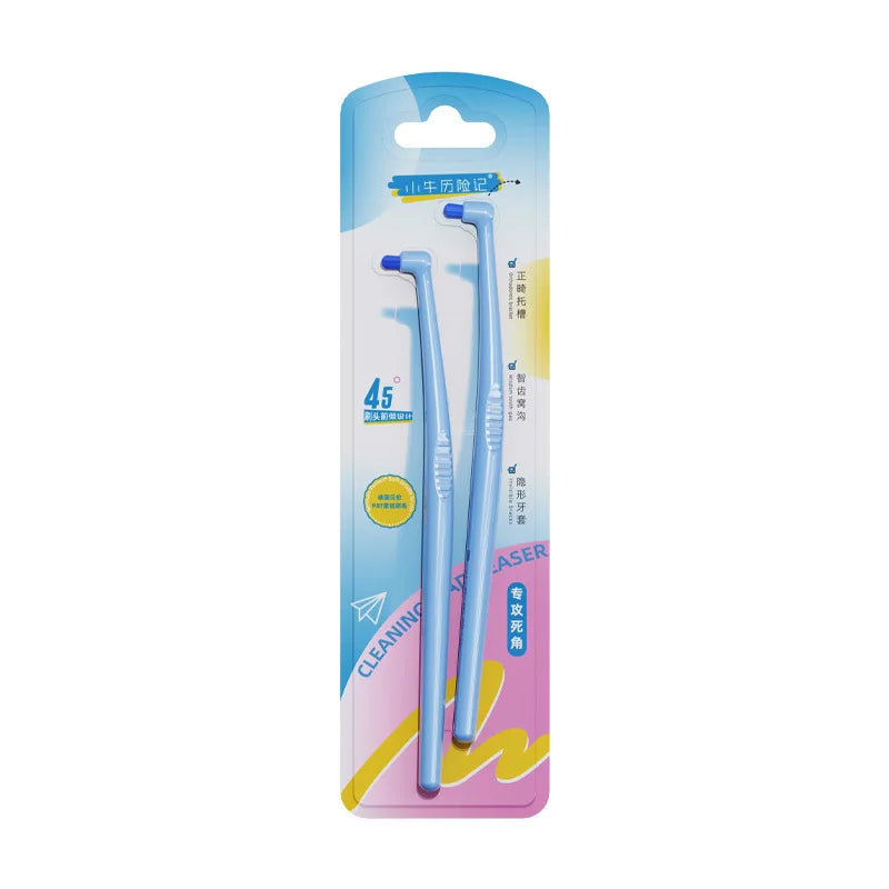 Double pack de brosses à dents orthodontiques pour un nettoyage en profondeur, emballé dans une boîte bleue et rose.