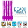 Toallas de playa a rayas moradas y blancas, con texto que lista usos como picnic, yoga, natación, playa y viajes.