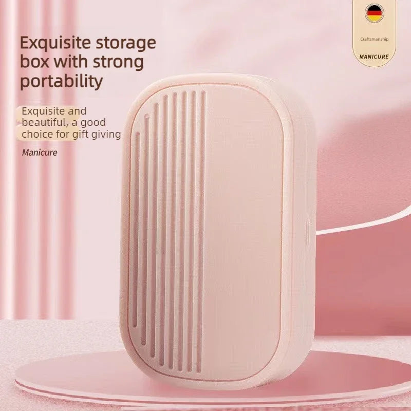A pink storage box for a stainless steel nail clipper set is shown on a pink surface.