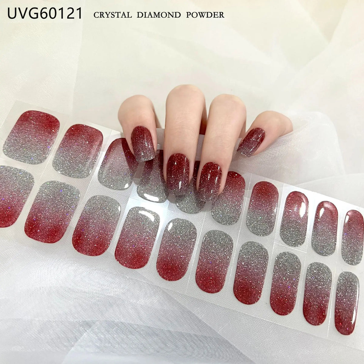 UVG60121 crystal diamond powder nail stickers in various shades applied to fingernails