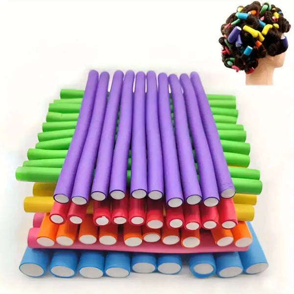 A collection of colorful soft foam heatless hair rollers in various shades of purple, green, yellow, and orange.