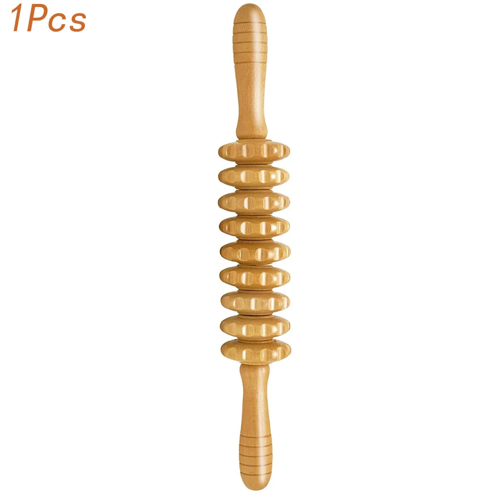 A natural wood gua sha roller tool used for detox and slimming.