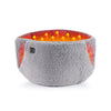 A gray electric heating therapy belt with orange heat indicators on the top surface.