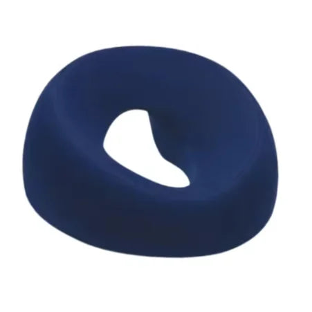 A dark blue ergonomic memory foam prone pillow with a cutout for relaxation.