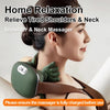 A woman is using a green shoulder and neck massager device on her neck and shoulder area.