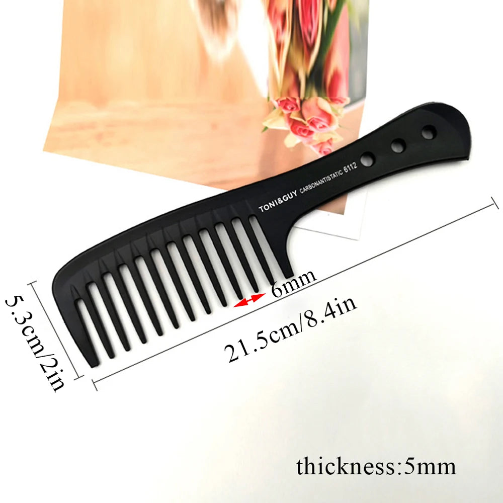 A black anti-static carbon hair comb with 6mm teeth is shown next to a ruler for scale.