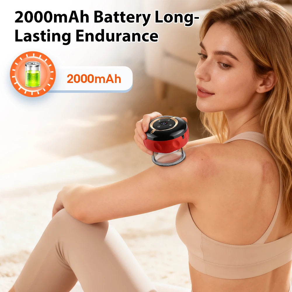 A woman is using a handheld electric cupping massager on her shoulder during a workout or relaxation session.