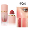 A tube of liquid matte blush stick in pink packaging with a round brush and swatch examples.