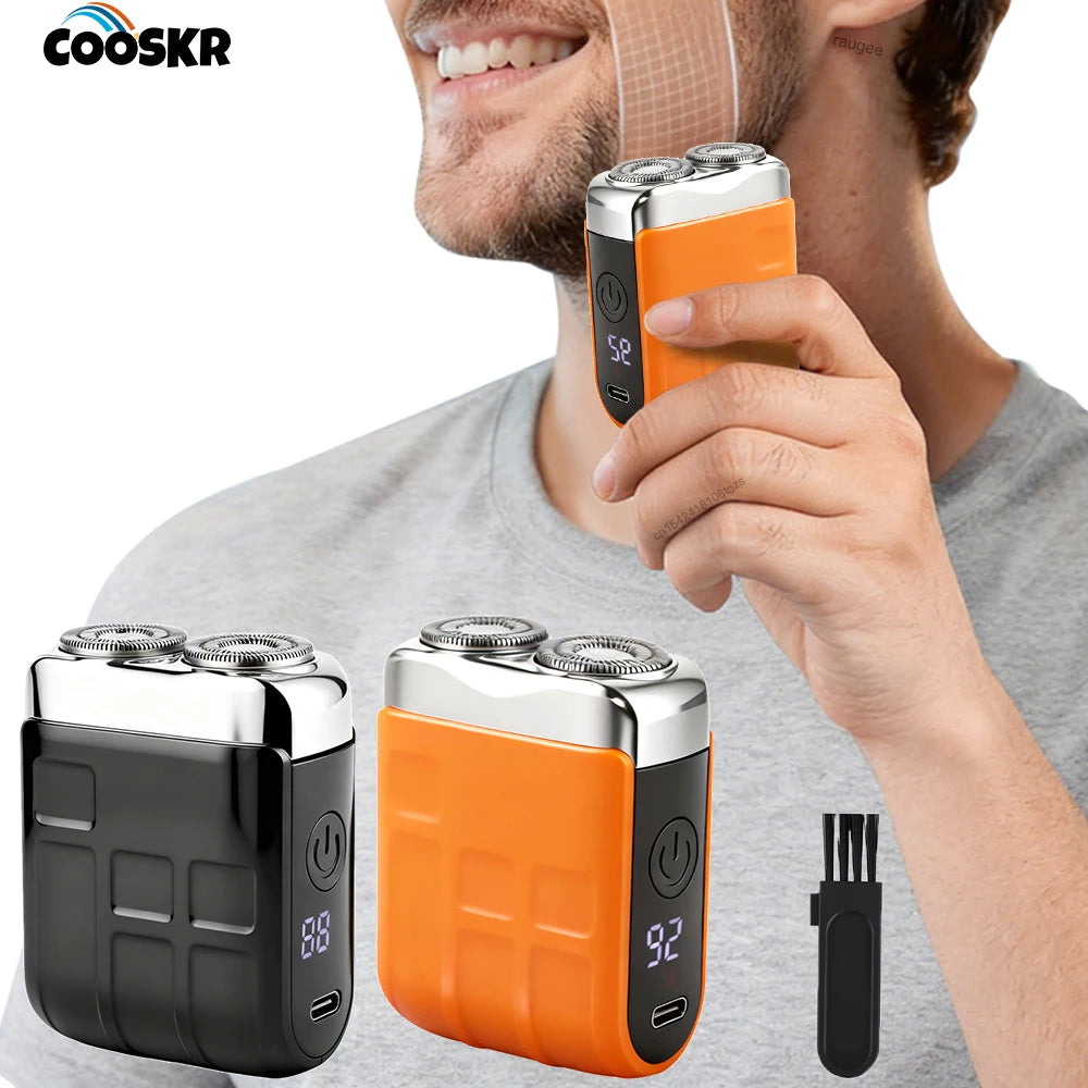 A hand holds an orange dual-head rechargeable electric beard trimmer with a black body and a separate attachment.