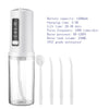 A white portable high-pressure oral irrigator device with a clear water tank and several silicone tips.
