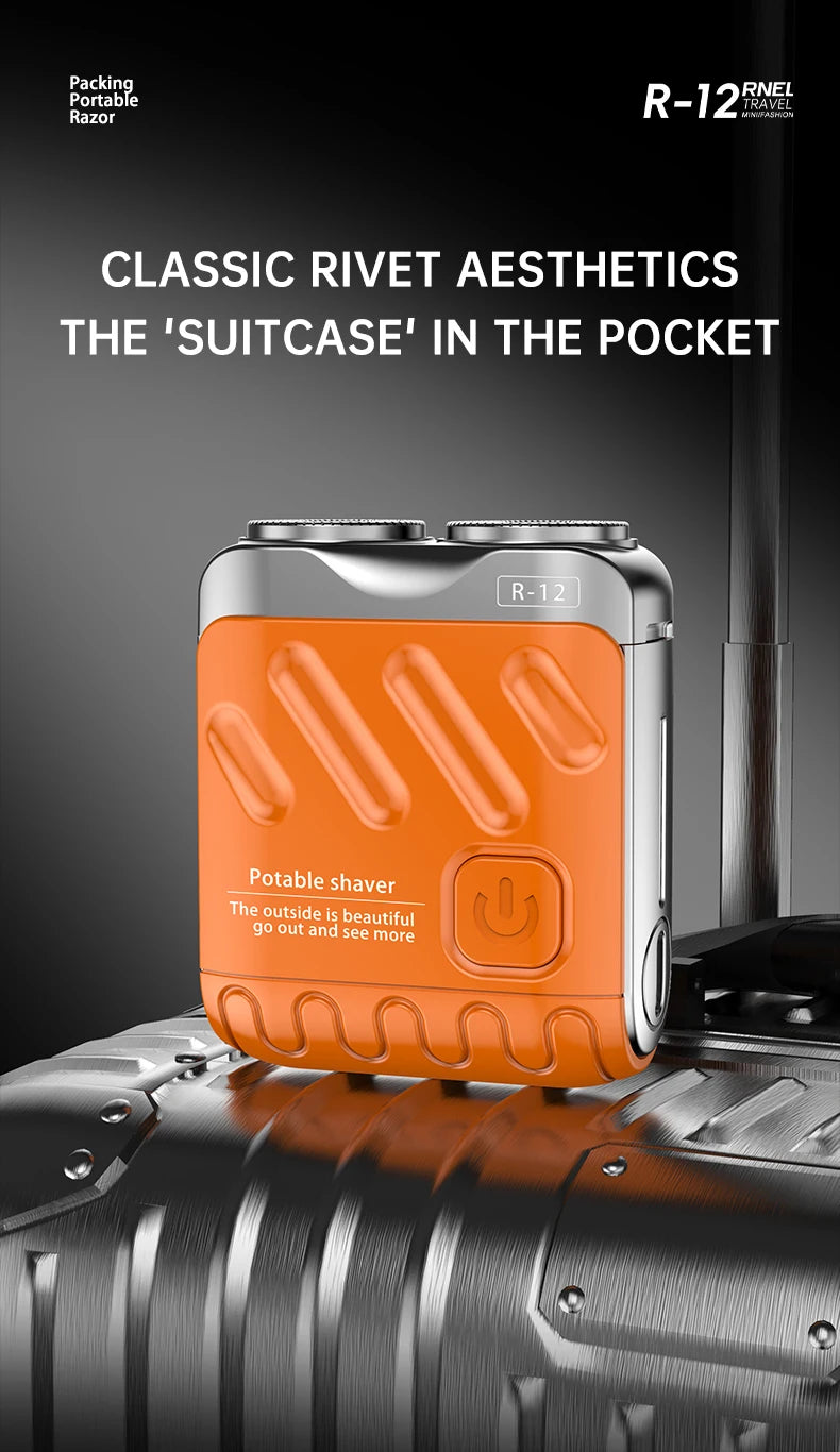 An orange portable shaver with a silver casing is shown resting on a metallic surface.