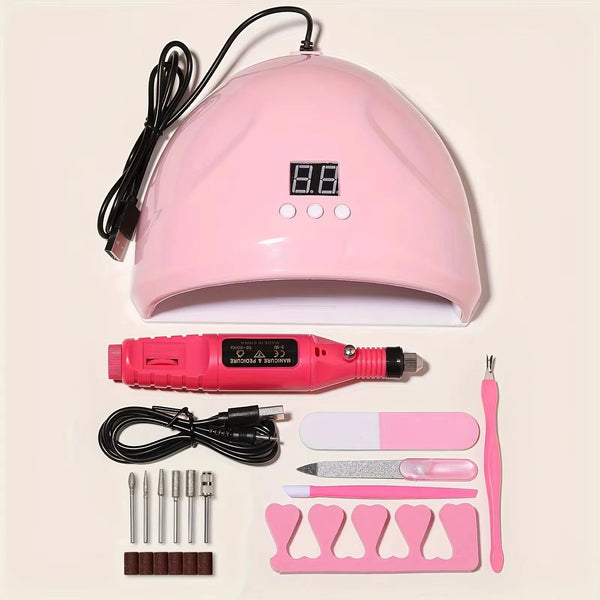 A pink professional nail care kit featuring an electric drill, UV LED lamp, and various manicure tools.