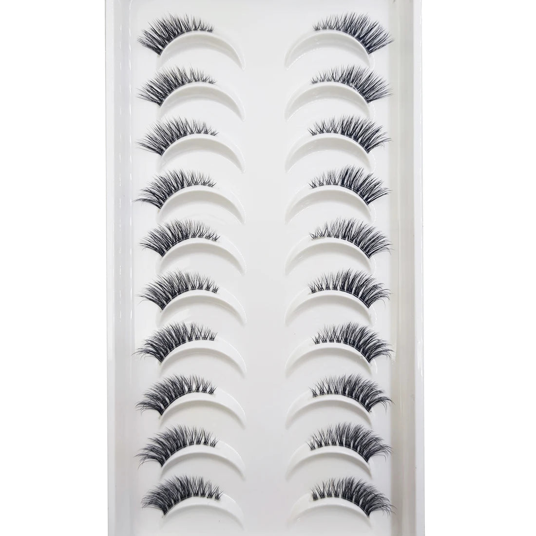 A display of natural 3D mink false eyelashes arranged in rows.
