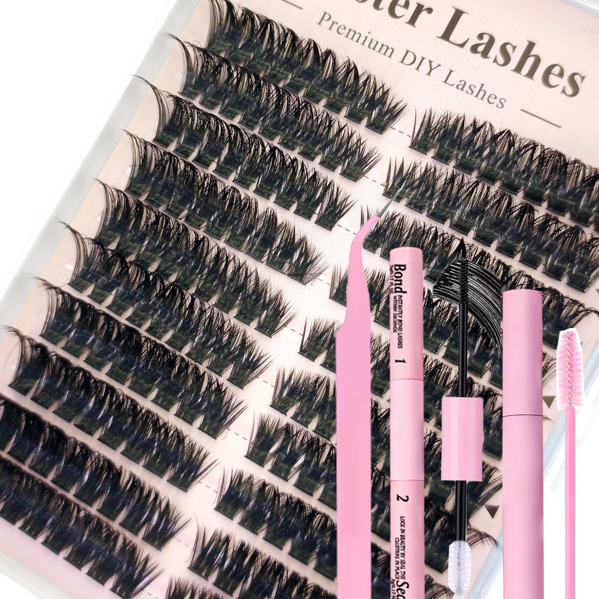 A pink DIY lash extension kit showing various lash styles and tools for salon use