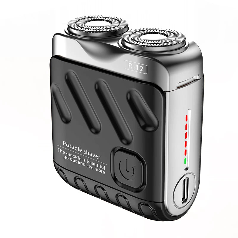 A silver and black dual-head electric shaver with a removable head is shown from the side.
