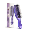 A purple Japanese-style scalp massage brush comb for hair styling and relaxation is shown next to its packaging box.