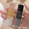 A clear box of mixed stainless steel beads in various colors and sizes for nail art decorations