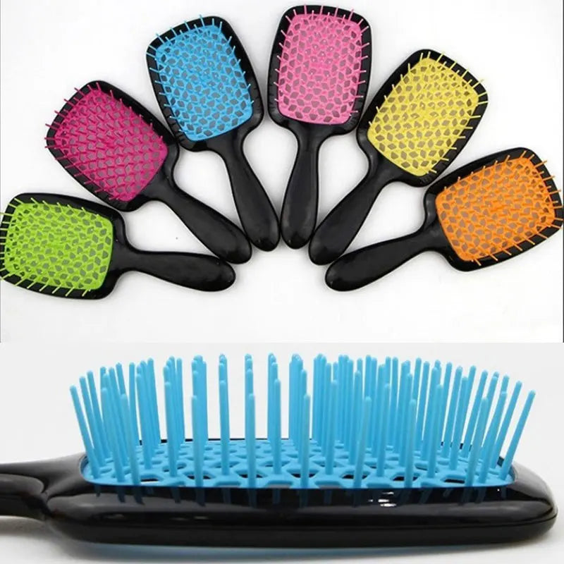 A collection of colorful anti-static air cushion hair combs and scalp massagers displayed on a white background.