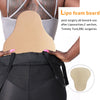 A light tan Lipo foam board is shown being placed on the abdomen of a person wearing black clothing.