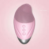 A pink USB rechargeable facial cleansing brush with a textured silicone head and silver base.