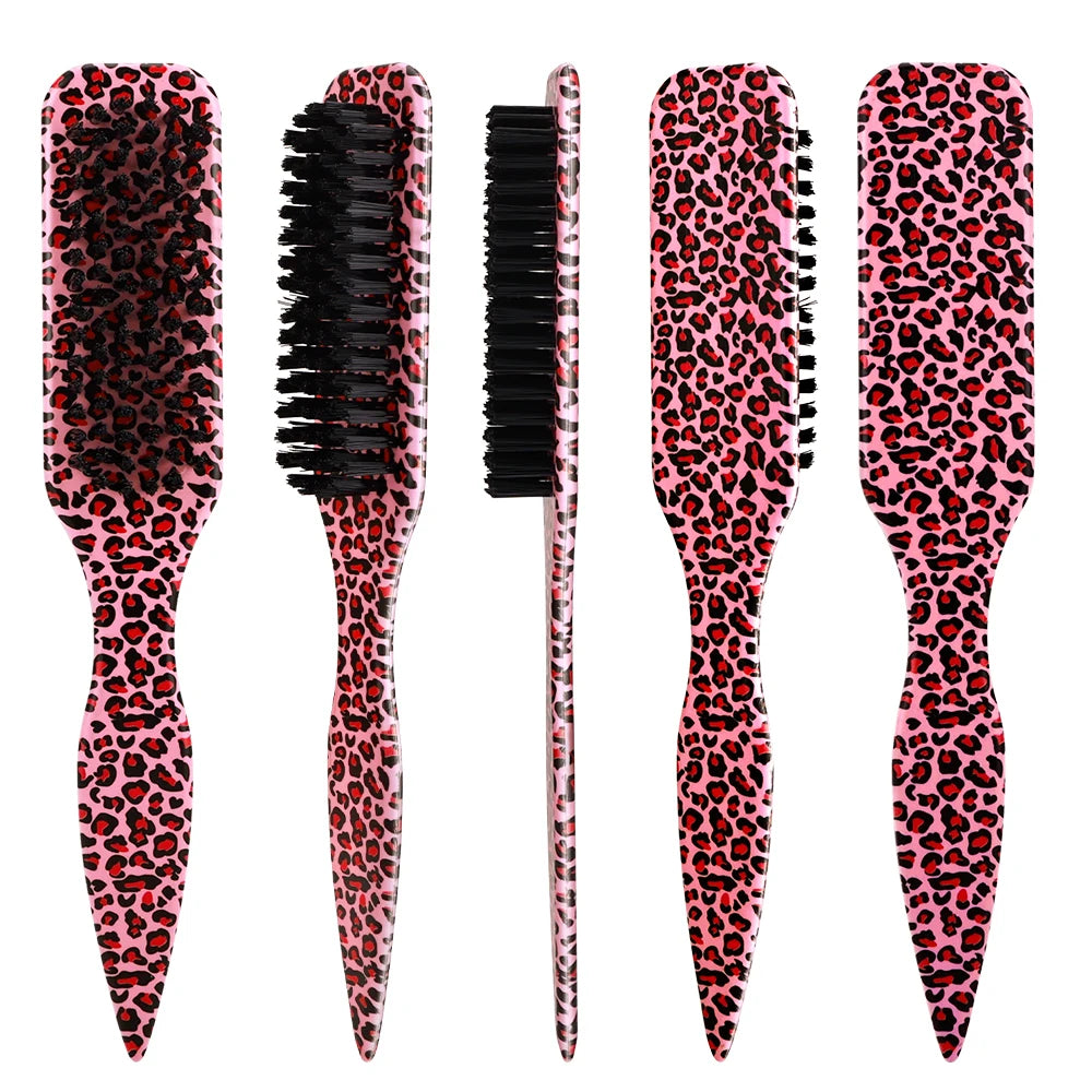 A set of four pink leopard print boar bristle hair styling brushes with metal tail combs.