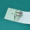 A light mint green nail and brow grooming kit with stainless steel tools shown against a teal background.