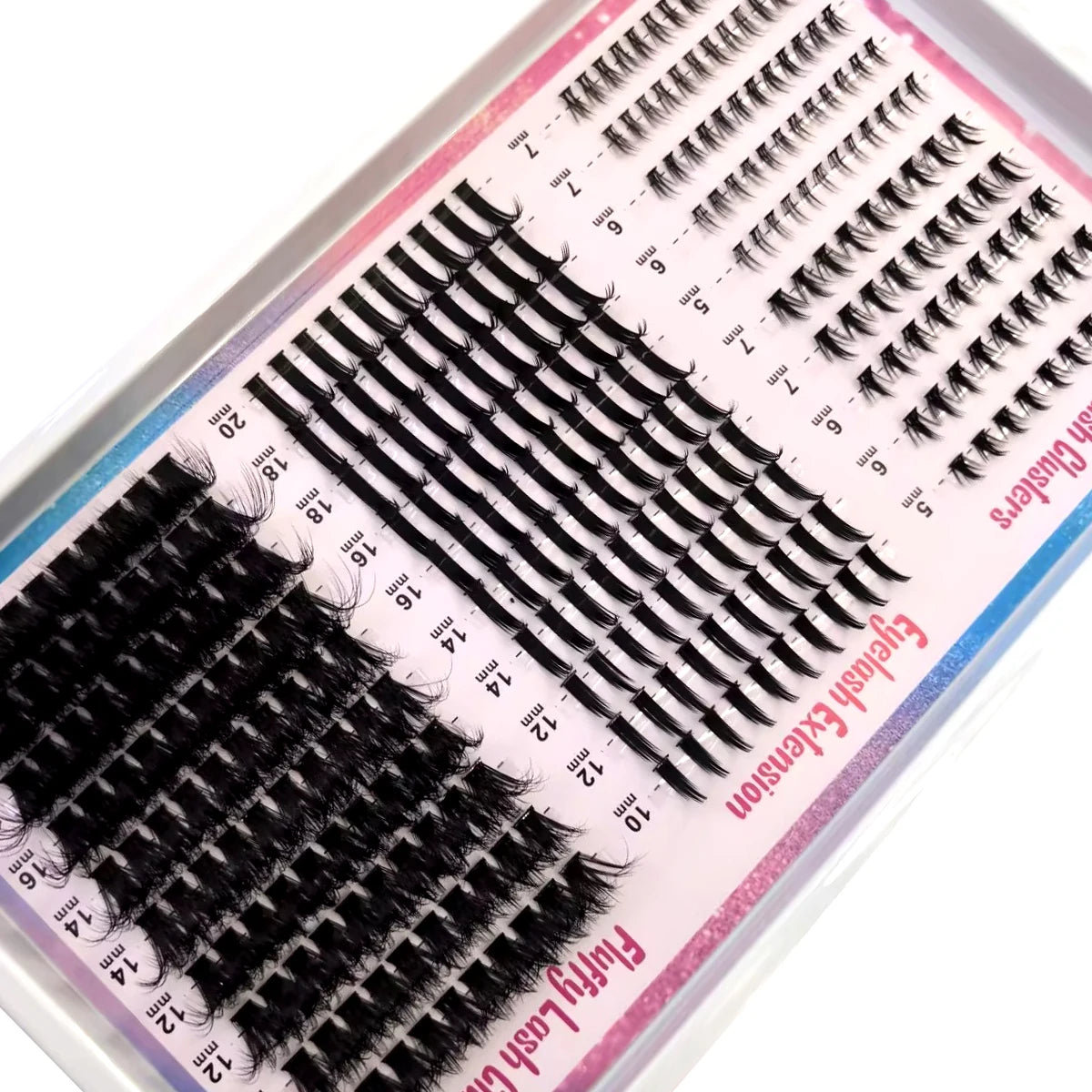 Présentation d'amas de cils pointus DIY pour extensions de cils de salon, montrant divers styles et longueurs.