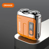 An orange mini electric smart shaver resting on a gray surface.