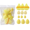 Un set de doce esponjas de maquillaje amarillas y anaranjadas empaquetadas en una bolsa de plástico transparente.