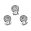 Three replacement shaver heads for electric razors showing various cutting discs.