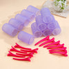 A set of purple and pink self-grip hair rollers for creating heatless curls and volume.