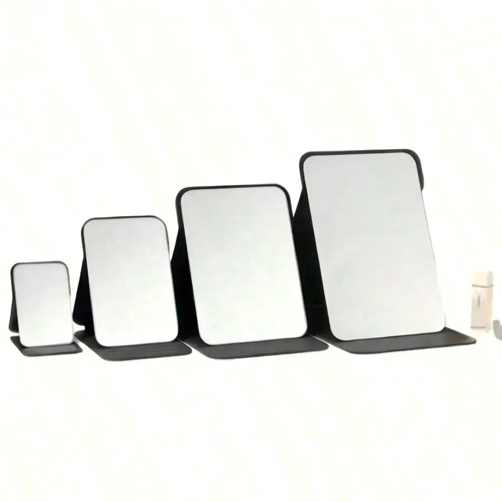 A set of three foldable portable makeup mirrors displayed on a white background.